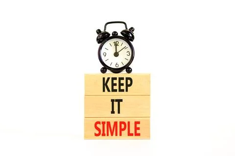 Keep it simple symbol. Concept word Keep it simple on beautiful wooden bloc.. Stock Photos
