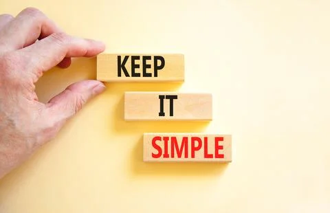 Keep it simple symbol. Concept word Keep it simple on beautiful wooden bloc.. Foto stock