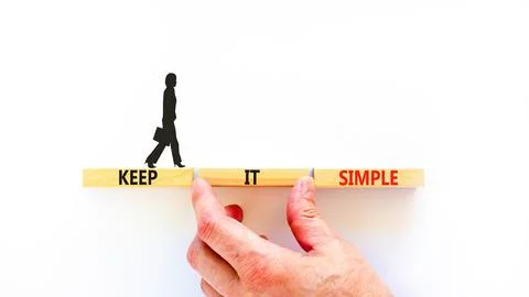 Keep it simple symbol. Concept word Keep it simple on beautiful wooden bloc.. Foto stock