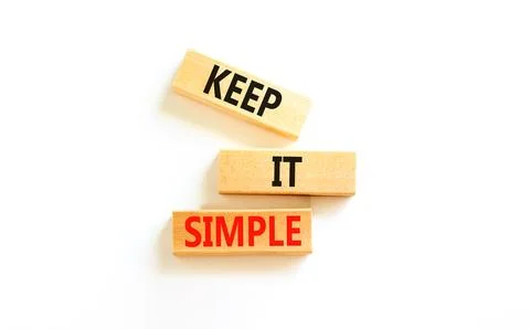 Keep it simple symbol. Concept word Keep it simple on beautiful wooden bloc.. Stock Photos
