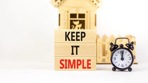 Keep it simple symbol. Concept word Keep it simple on beautiful wooden bloc.. Stock Photos