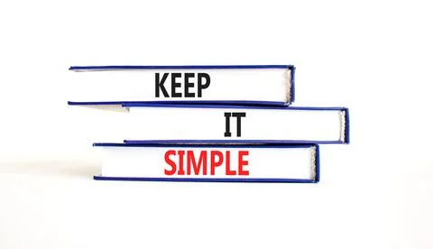 Keep it simple symbol. Concept word Keep it simple on beautiful books. Beauti Stock Photos