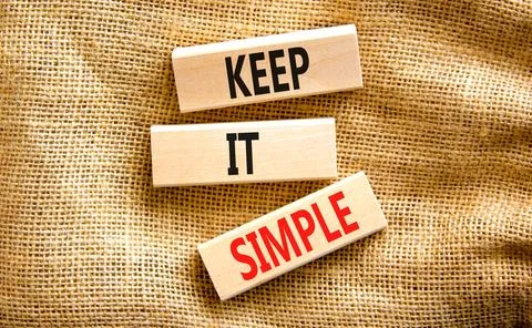 Keep it simple symbol. Concept word Keep it simple on beautiful wooden bloc.. Foto stock