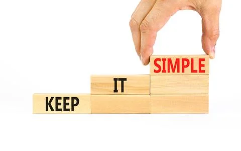 Keep it simple symbol. Concept word Keep it simple on beautiful wooden bloc.. Foto stock