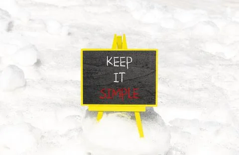 Keep it simple symbol. Concept word Keep it simple on beautiful black chalk.. Foto stock