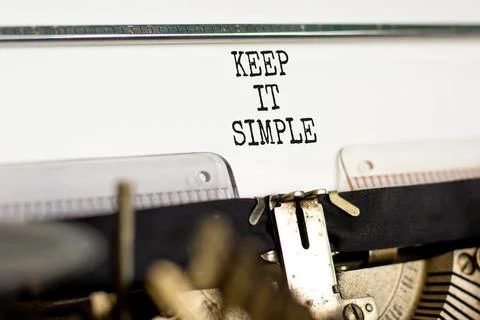 Keep it simple symbol. Concept word Keep it simple typed on beautiful retro o Stock Photos