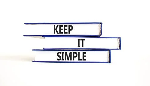 Keep it simple symbol. Concept word Keep it simple on beautiful books. Beau.. Stock Photos