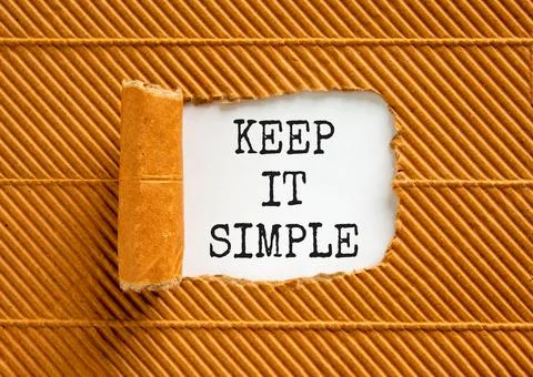 Keep it simple symbol. Concept word Keep it simple on beautiful white paper.. Stock Photos