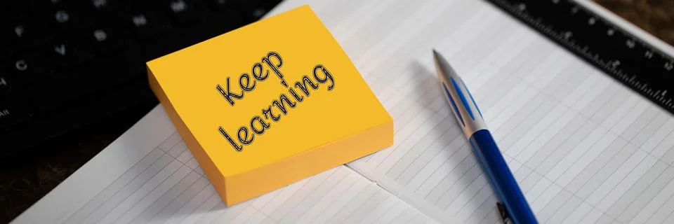 KEEP LEARNING. Close-up of a memory stick with the word. Stock Photos