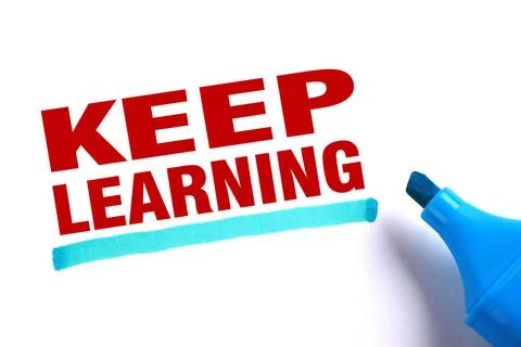 Keep learning Keep learning text and blue line with blue marker aside is o... Stockfoto's