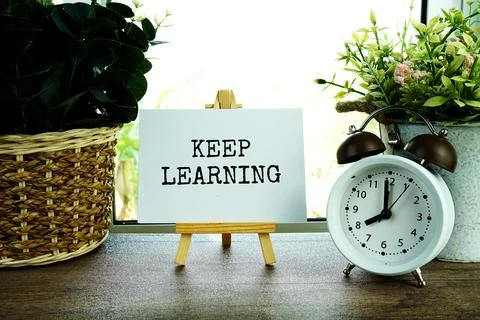 Keep learning text message, inspiration motivation concept Stock Photos