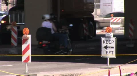 Keep Left Traffic Control Sign and Safety Barracades On The Frontage Road Video stock 19142844