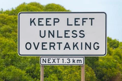 Keep left unless overtaking street sign in Australia Stock Photos