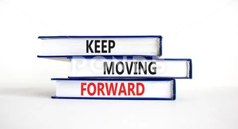 Photograph: Keep moving forward symbol. Concept words Keep moving ...