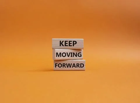 Keep moving forward symbol. Concept words keep moving forward on wooden block Stock Photos