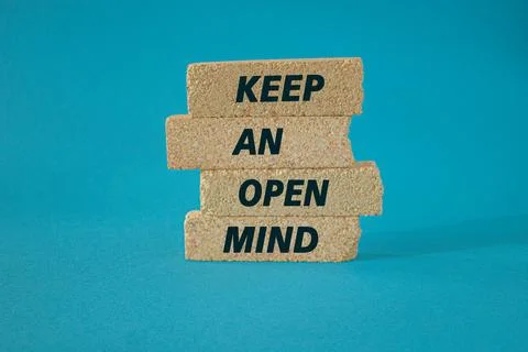Keep an open mind symbol. Brick blocks with words Keep an open mind. Stock Photos
