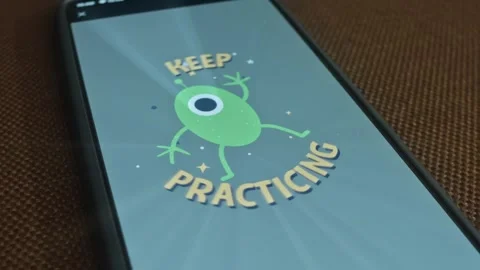 Keep practicing inscription with cartooned Alien, presentation Stock Footage 309564801
