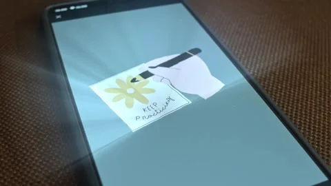 Keep Practicing inscription on a sheet of paper with hand drawn flower and hand Stock-Footage 309564656