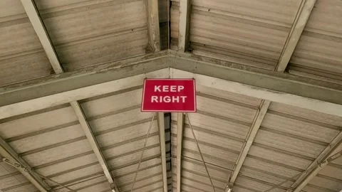 Keep Right Informational Sign Hanging on a Bridge Stock Footage 236591552