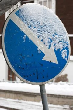 Keep right sign with diagonal directional arrow. Stock Photos