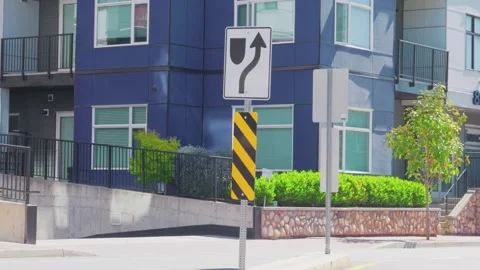 Keep right traffic regulatory sign on a street island Video stock 341982408