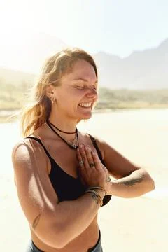Keep shining, the world needs your light. a beautiful young woman practising Stock Photos