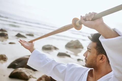 Keep training until the belt turns black. Shot of a young martial artist Stock Photos
