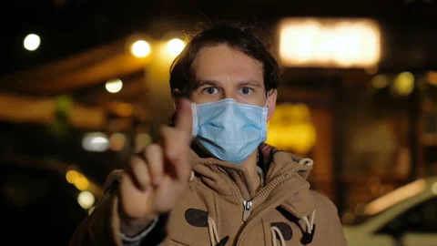 Keep your distance - man with mask prohibits the camera from approaching Stock Footage 144762727