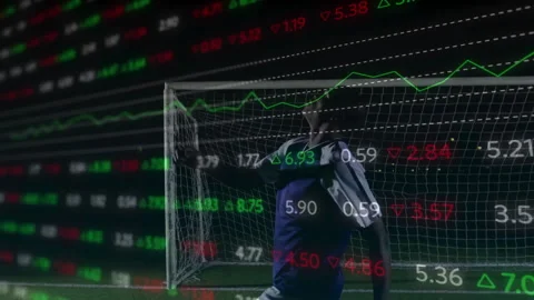 Keeper diving and deflecting incoming shot to save goal with finance data Stock Footage 314408881