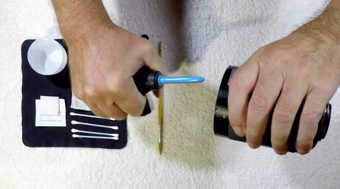 Keeping camera lenses clean for consistent shooting. Stock Footage 63297146