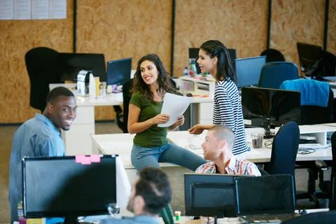 Keeping each other in the loop with an informal meeting. a team of colleagues Stock Photos