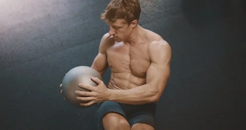 Keeping his core tight, and his abs looking good Stock Footage 126786064