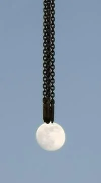Keeping the moon afloat 写真素材