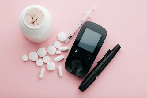 Keeping my diabetes under wraps. High angle shot of a blood glucose meter and Stock Photos