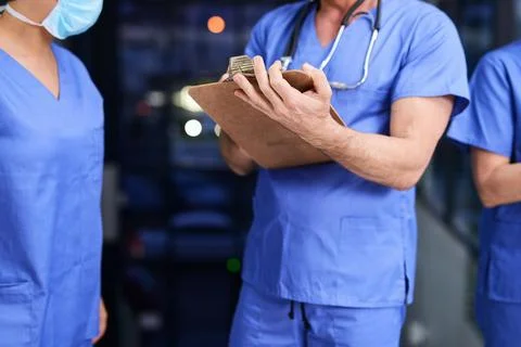 Keeping track of their patients progress. a medical practitioner writing notes Stock Photos
