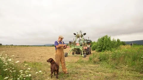 Keeping updated on the farm Stock Footage 246873986