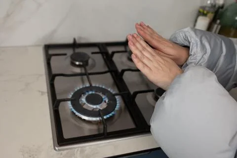 Keeping Warm During Winter by Using Gas Stove for Heat Conservation Stock Photos