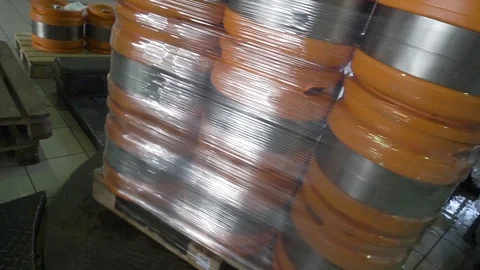 Kegs with beer wrapped in plastic wrap before transportation Video stock 119392217