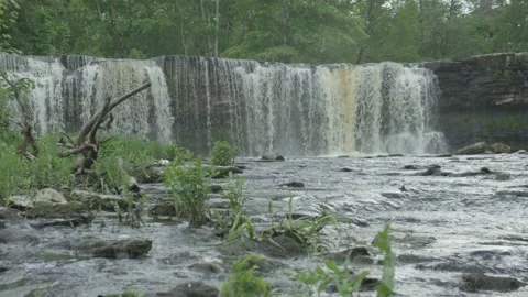 Keila waterfall with stream in foreground in summer evening Video stock 159982863