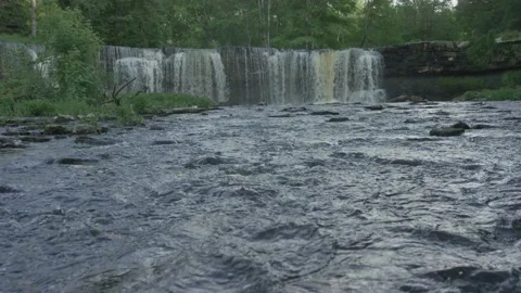 Keila waterfall with stream in foreground in summer evening Stock Footage 159982995