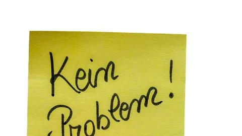 Kein problem (no problem)  handwriting text close up isolated on yellow pap.. 스톡 사진