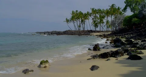 Kekaha park, sand beach and ocean waves,... | Stock Video | Pond5