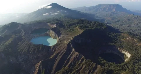 Kelimutu volcano colored lakes flyby 1 Stock Footage