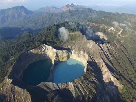 Kelimutu volcano colored lakes flyby 3 Stock Footage 80209323