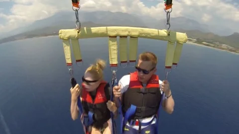 KEMER, TURKEY - June 30,2016 : Having fun with water parachute Stock Footage 74277643