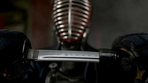 Kendo warrior demonstrates fighting attacks Stock Footage 77233210