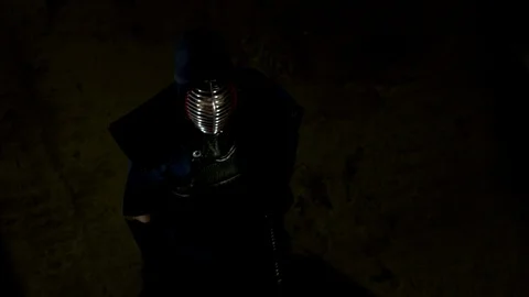 Kendo warrior demonstrates fighting attacks Stock Footage 77233212