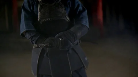 Kendo warrior demonstrates fighting attacks Stock Footage 77233277