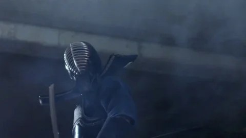 Kendo warrior demonstrates fighting attacks Stock Footage 77233324