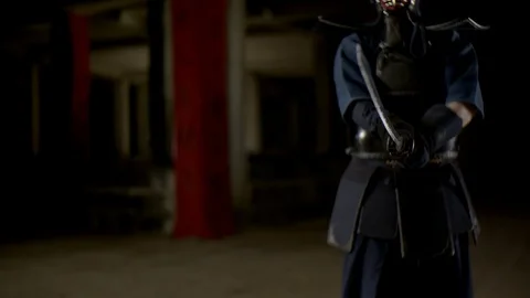 Kendo warrior demonstrates fighting attacks Stock Footage 77233542